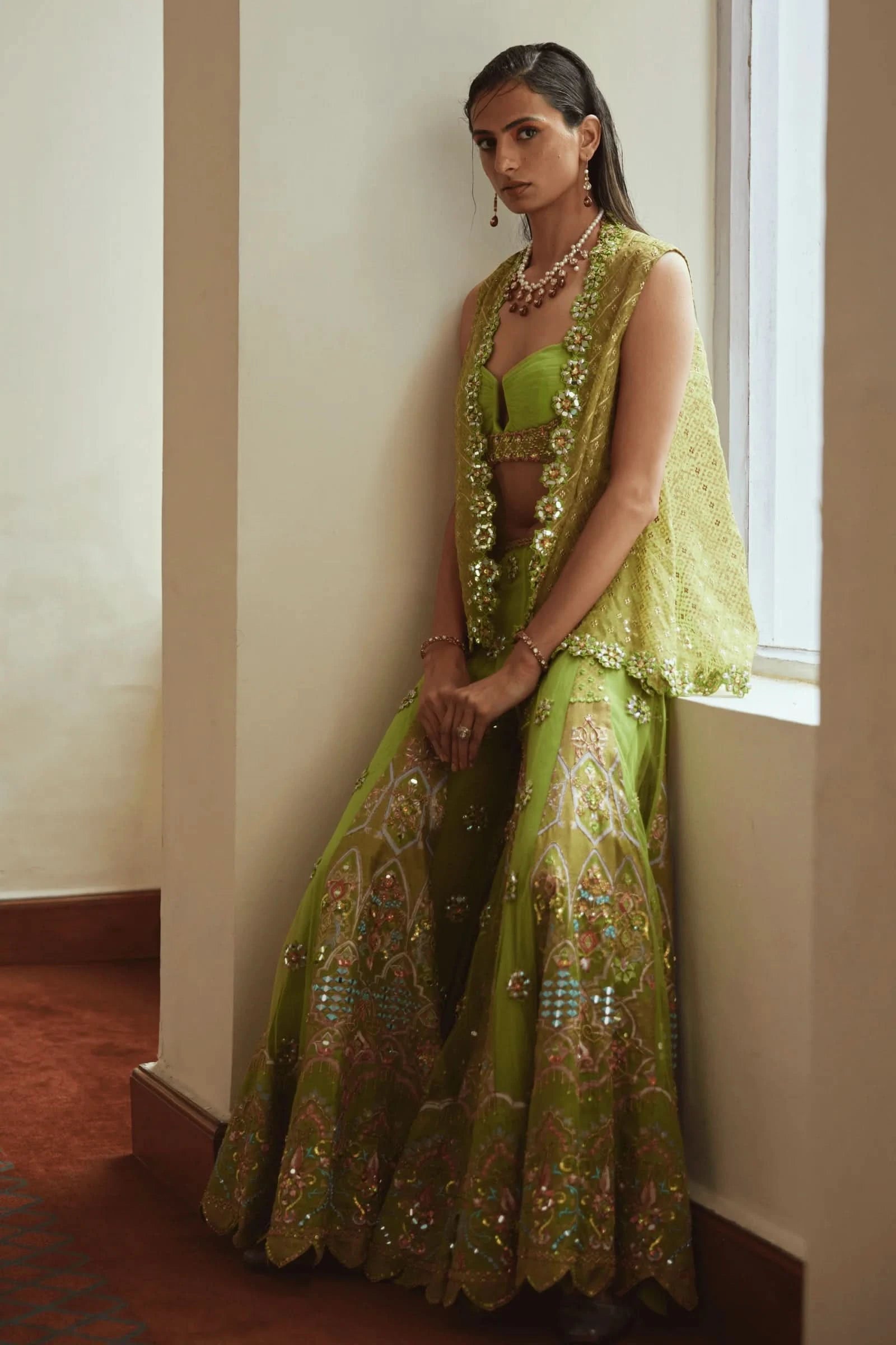 Women in green outfits