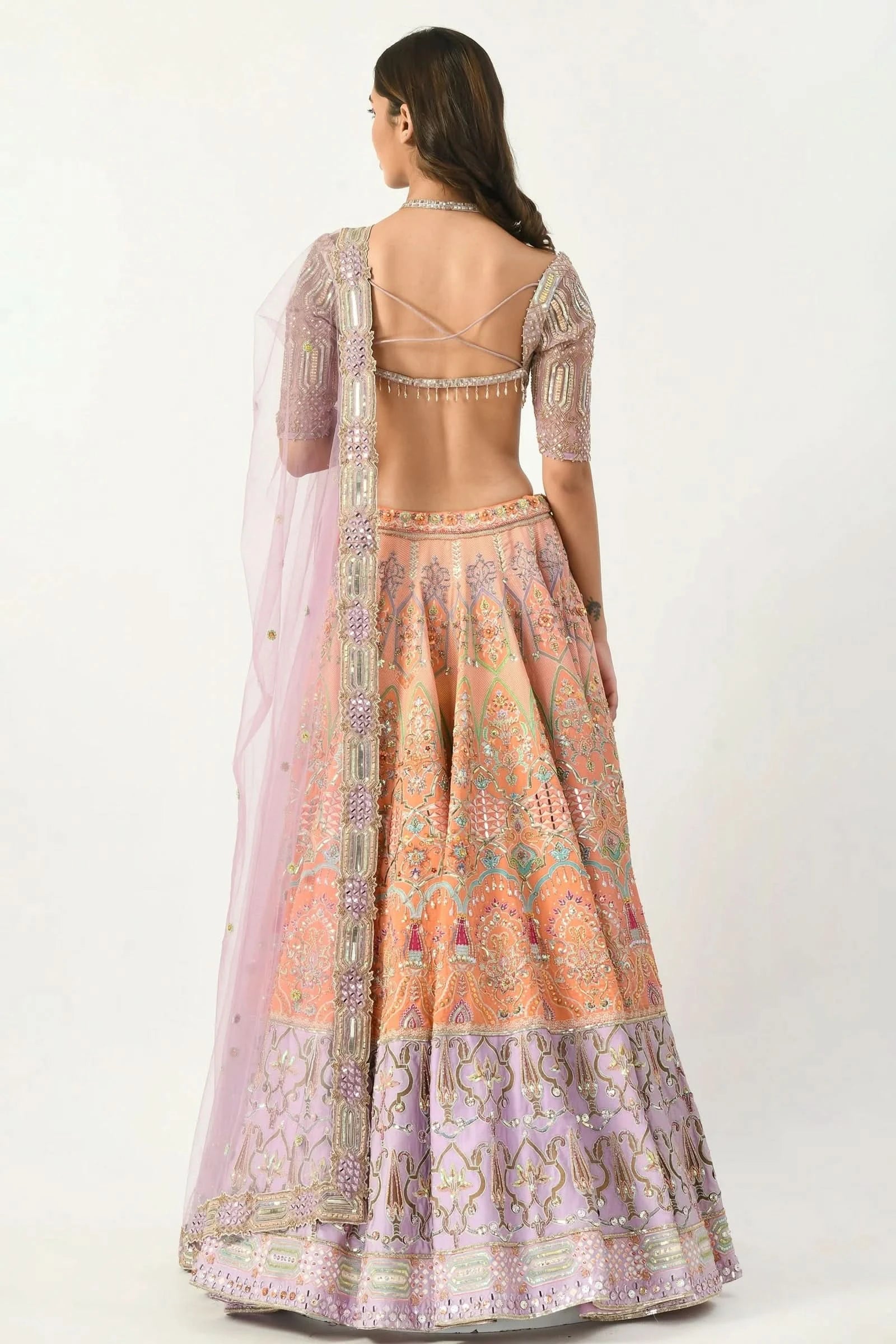 women's multicolor lehenga with backless blouse design