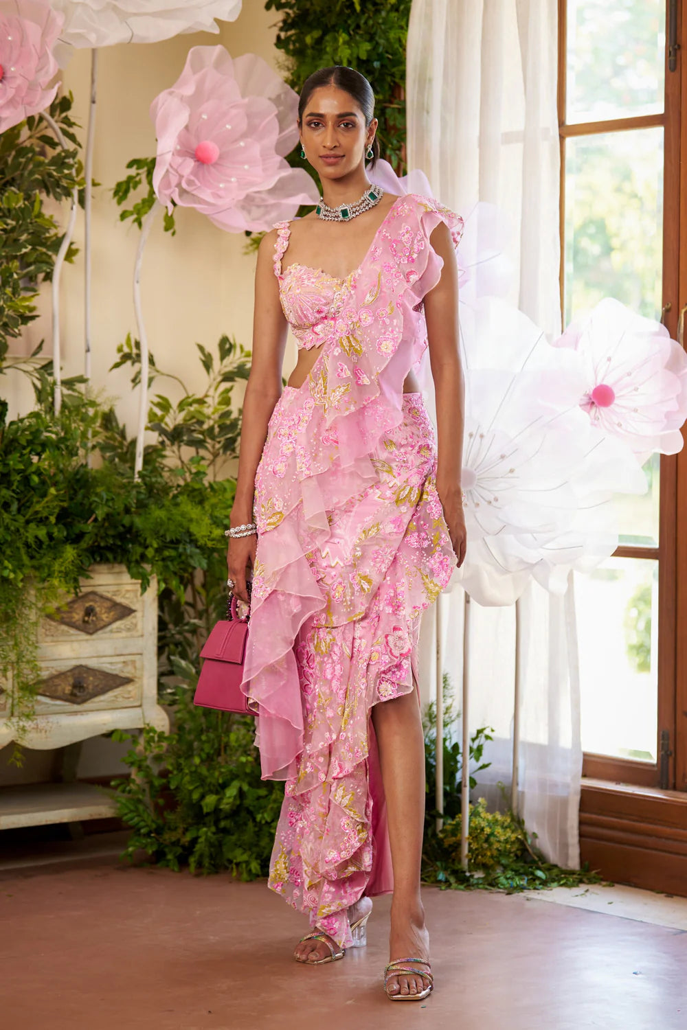 women in pink floral dress