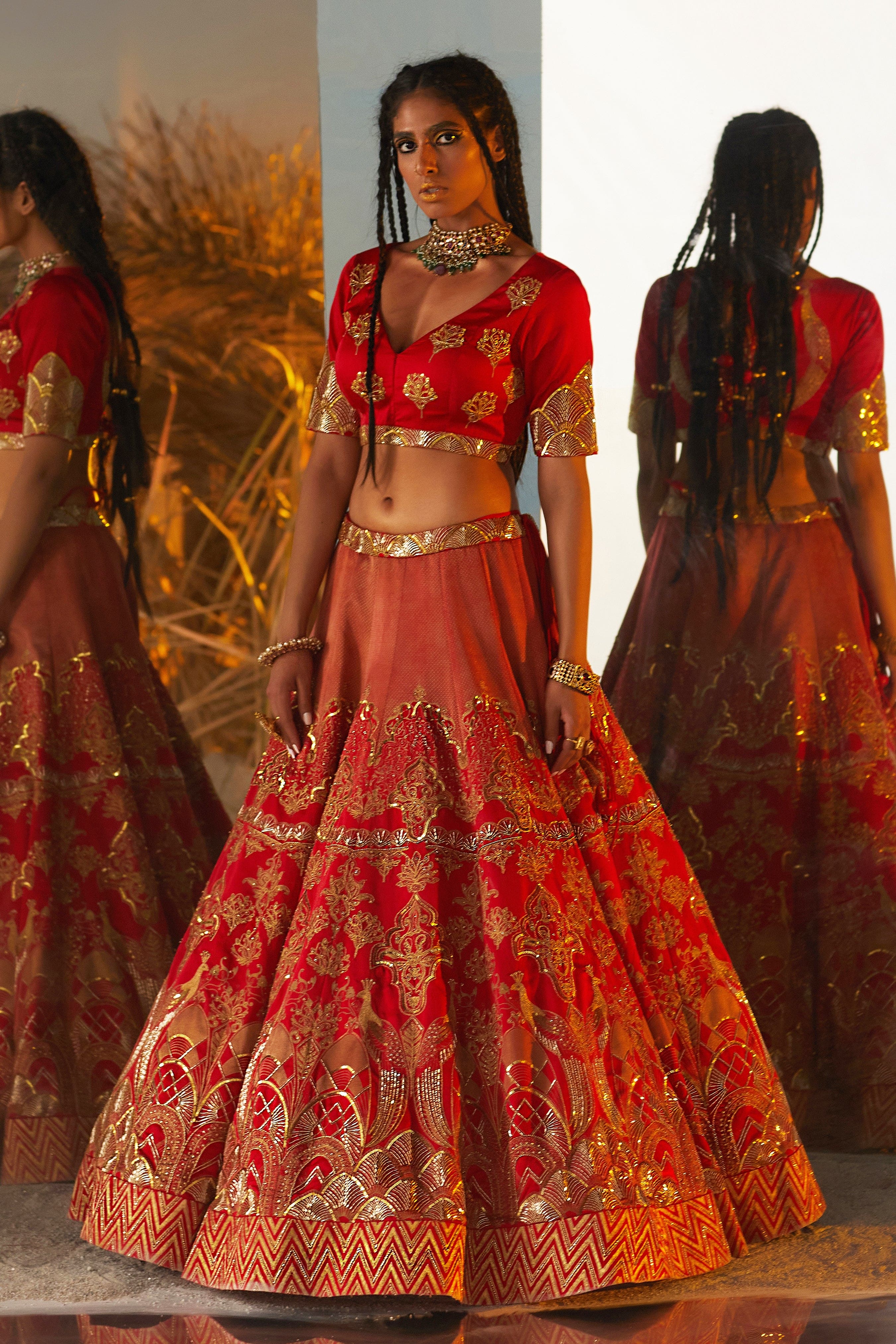 Designer red bridal wedding outfit, tailored for exclusive weddings and celebrations in Dubai UAE.