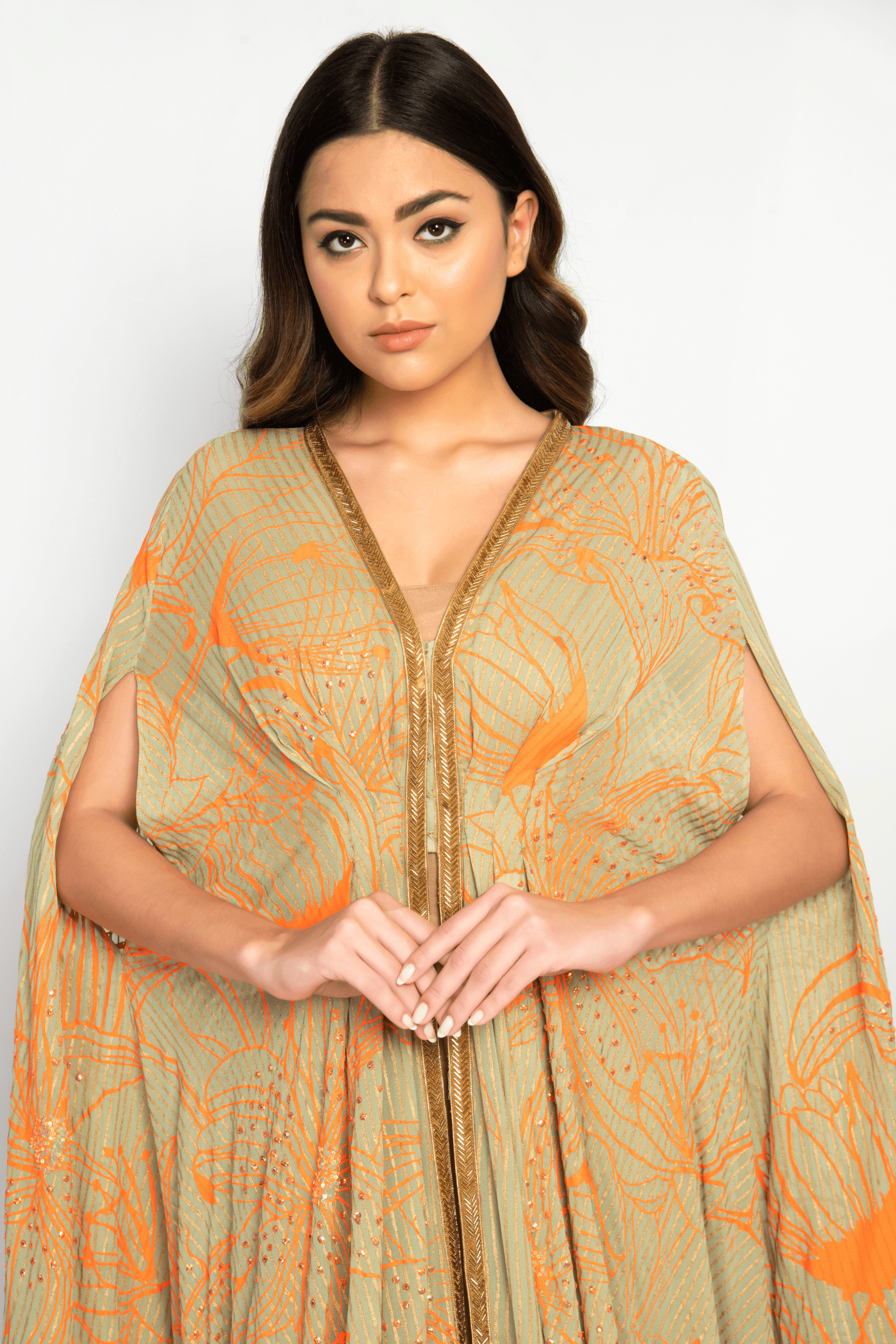 Block prints and subtle glitter adding intricate details to the Noor Kaftan.