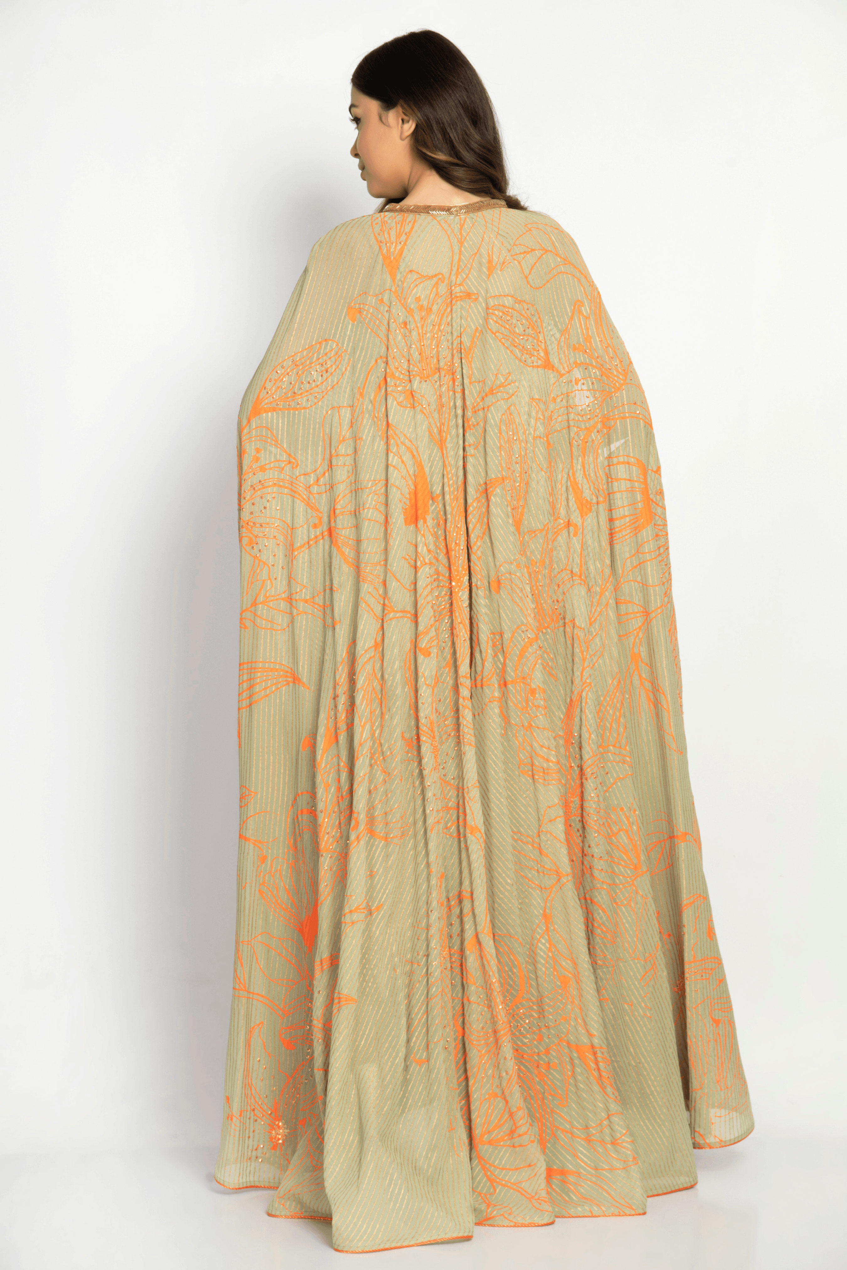 Flowy back view of the Noor Kaftan featuring block print accents and vertical lines.