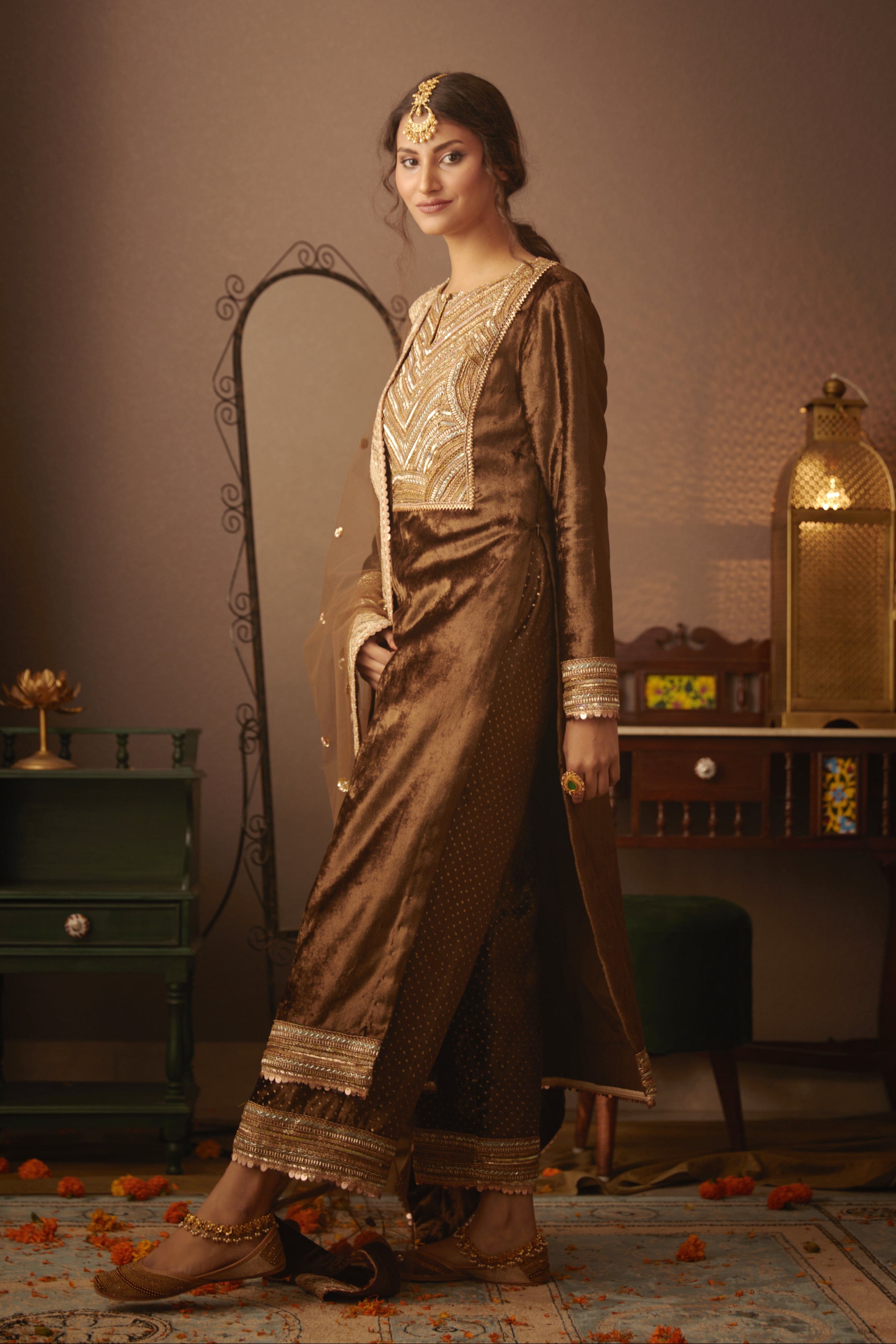 Nora Kurta Set Side profile highlighting its velvet fabric and elegant net dupatta.