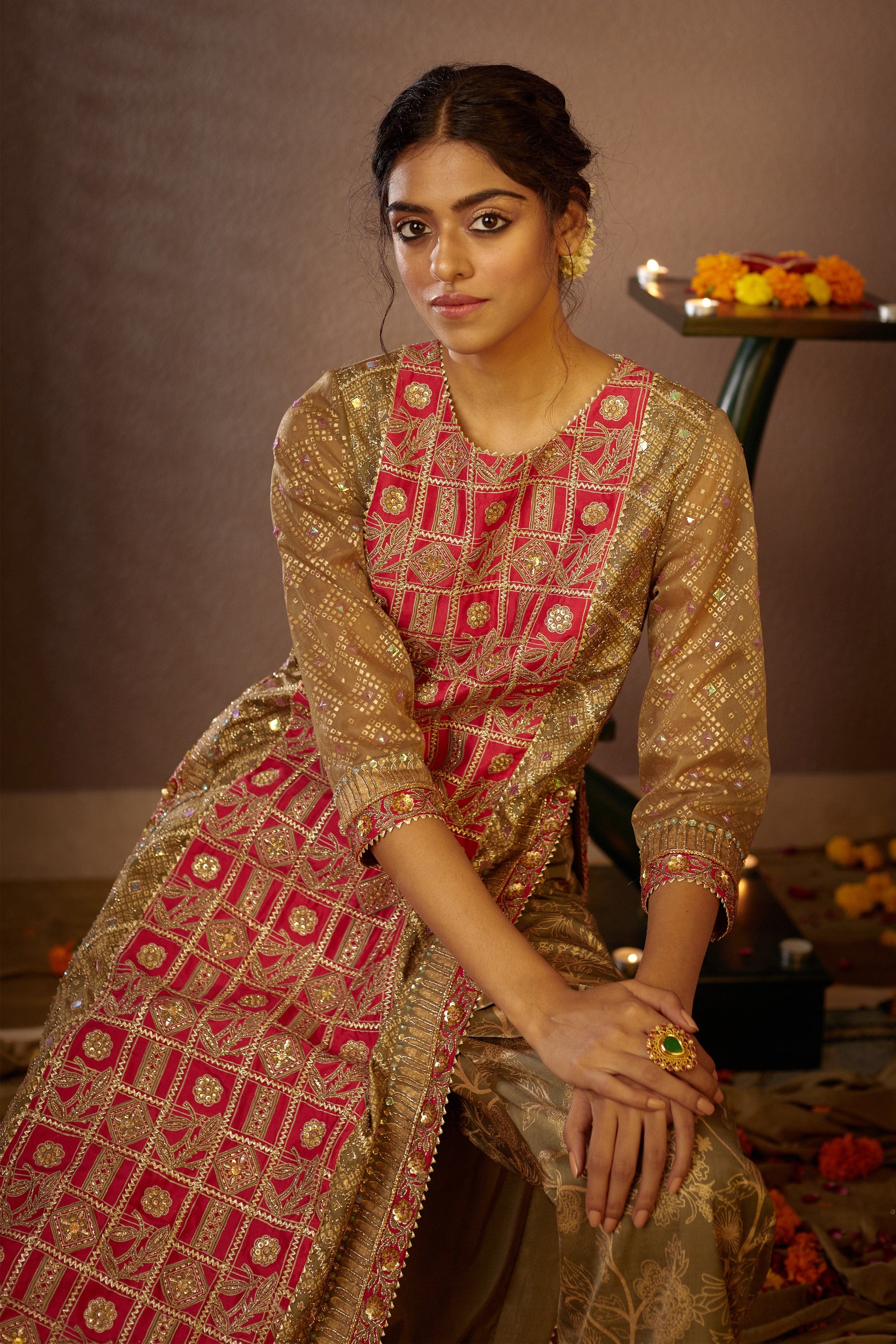 Delicate sequins and bead embellishments that enhance the vibrant tones of the Purvi Kurta, ideal for weddings and special events.