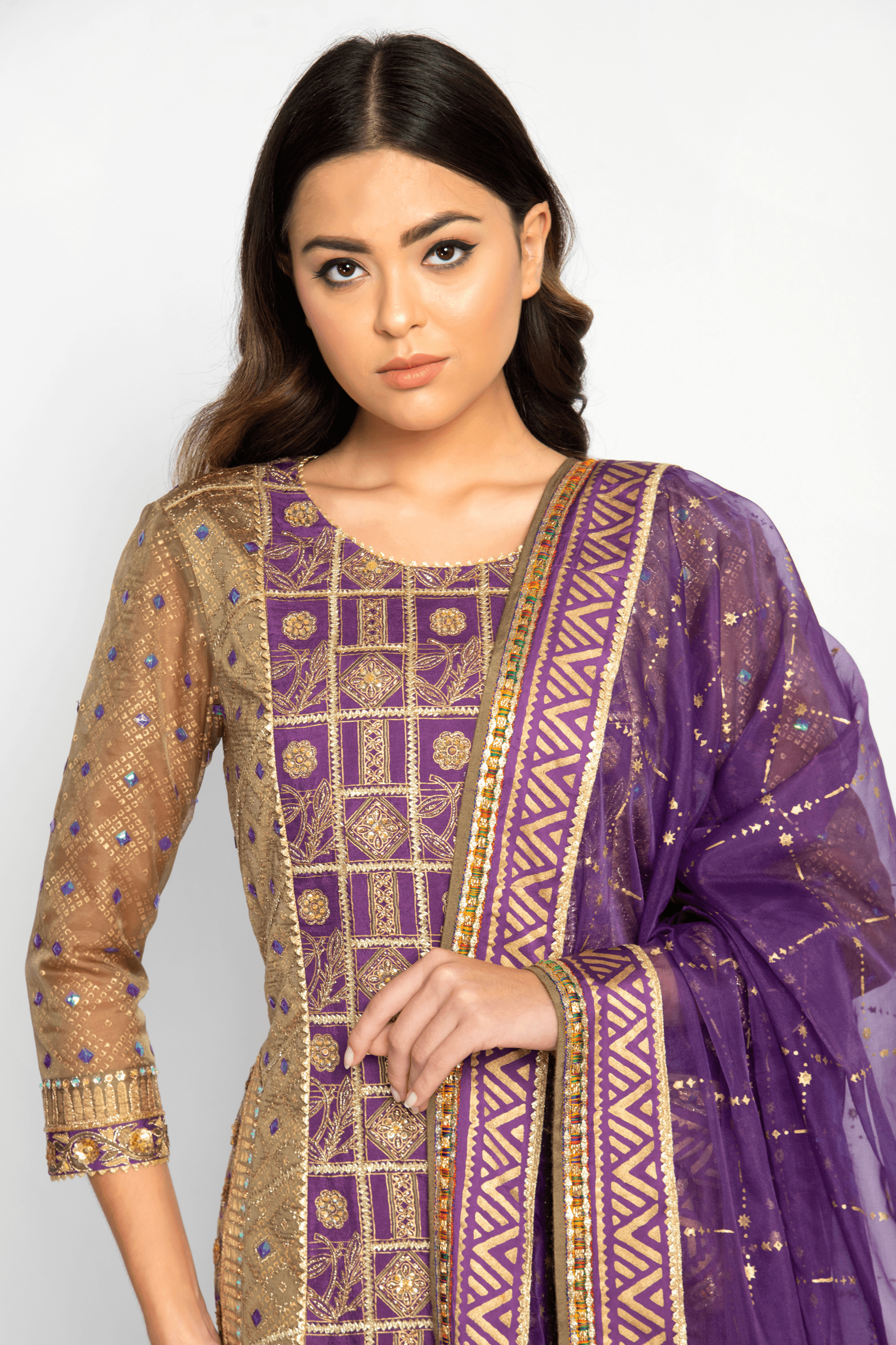 Detailed embroidery and sequin work on the vibrant bridal kurta, perfect for traditional wedding celebrations.