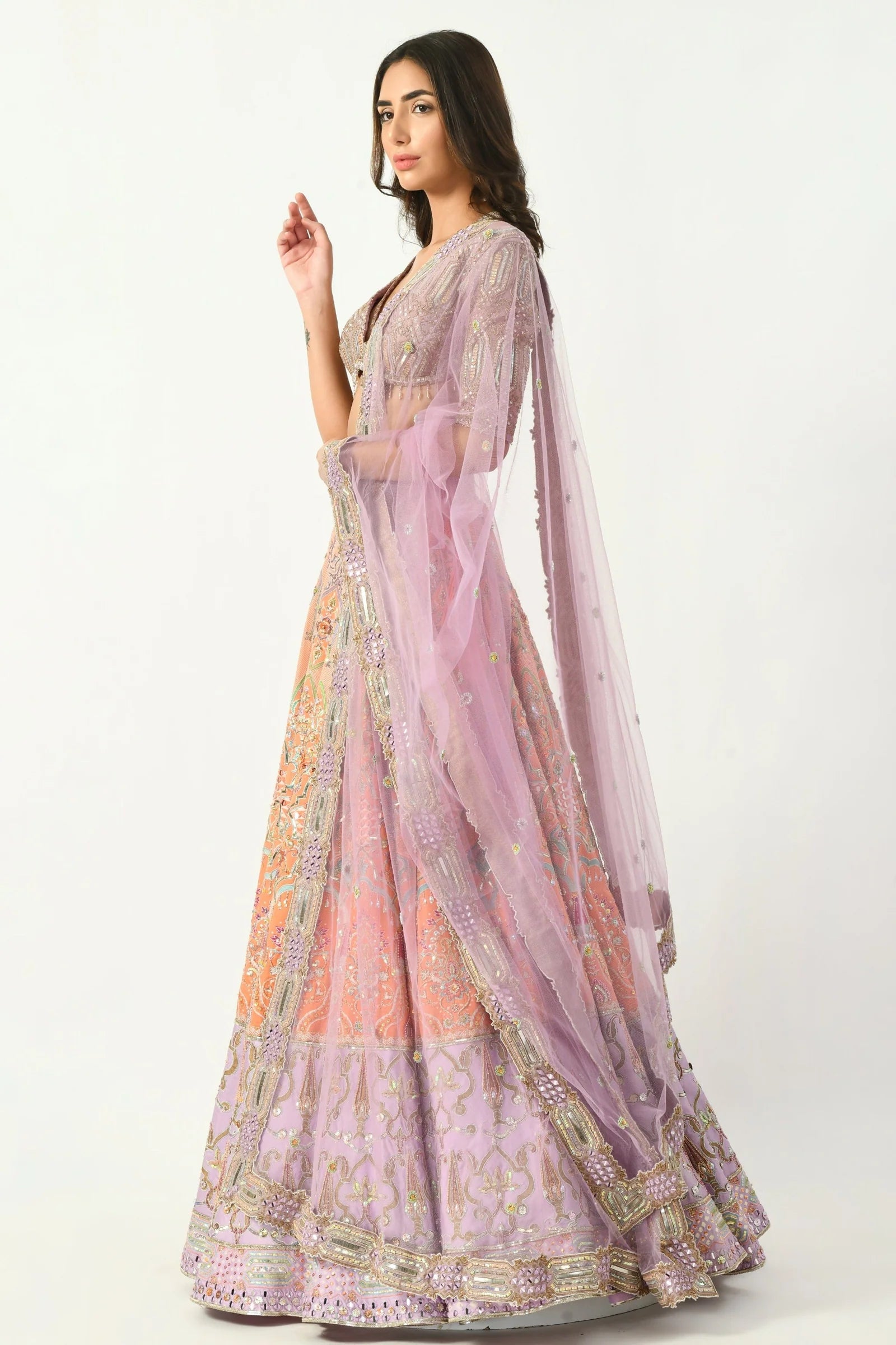 Designer mirrorwork and embroidery Lehengas