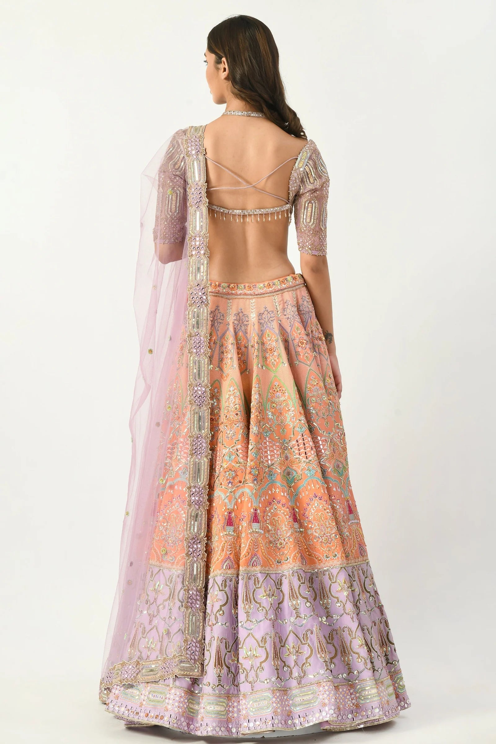 women's multicolor lehenga with backless blouse design