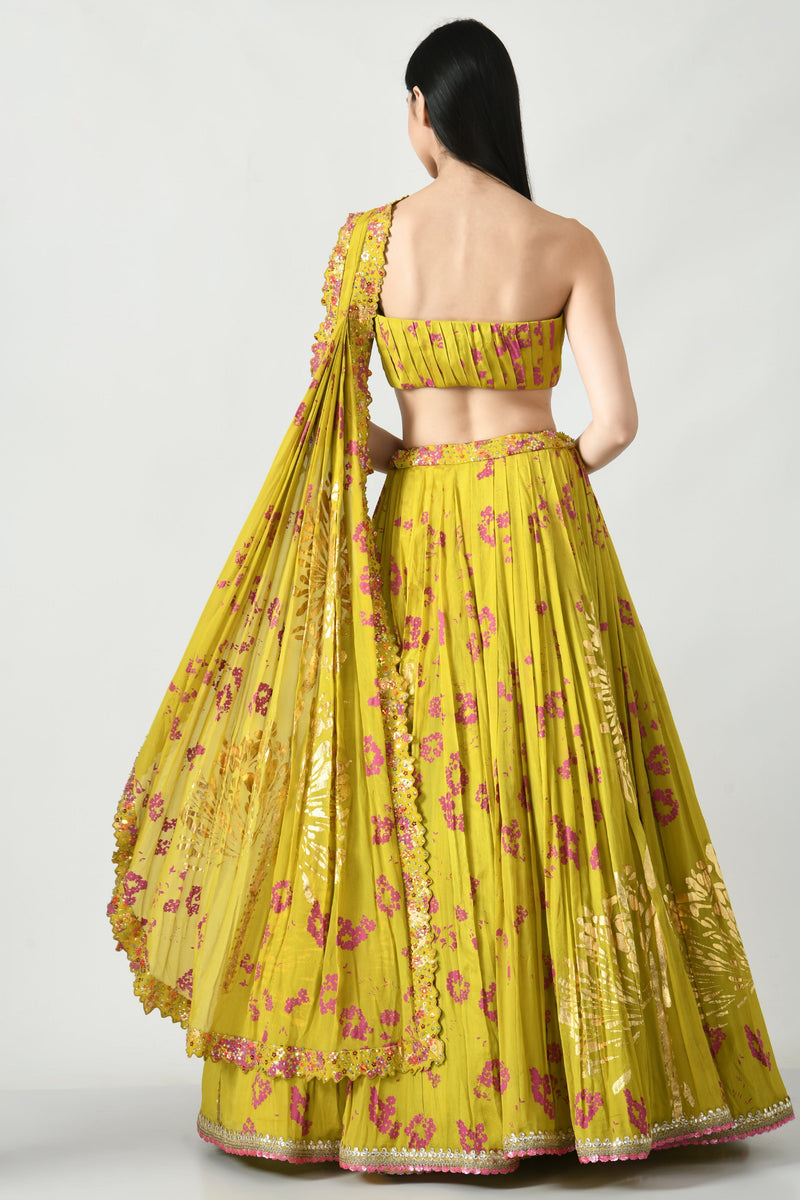 Back profile of the Humaira Lehenga showcasing detailed gathers and handcrafted tassels.