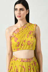 One-shoulder blouse with intricate floral designs and an attached flowing dupatta.