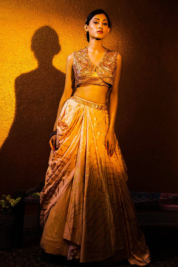 Hunar Jacket with Draped Skirt featuring a beaded bolero jacket, bustier, and waist belt. Indian designer wear by Moledro.