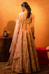 Hya Lehenga crafted with handmade tassels and sleeveless blouse.