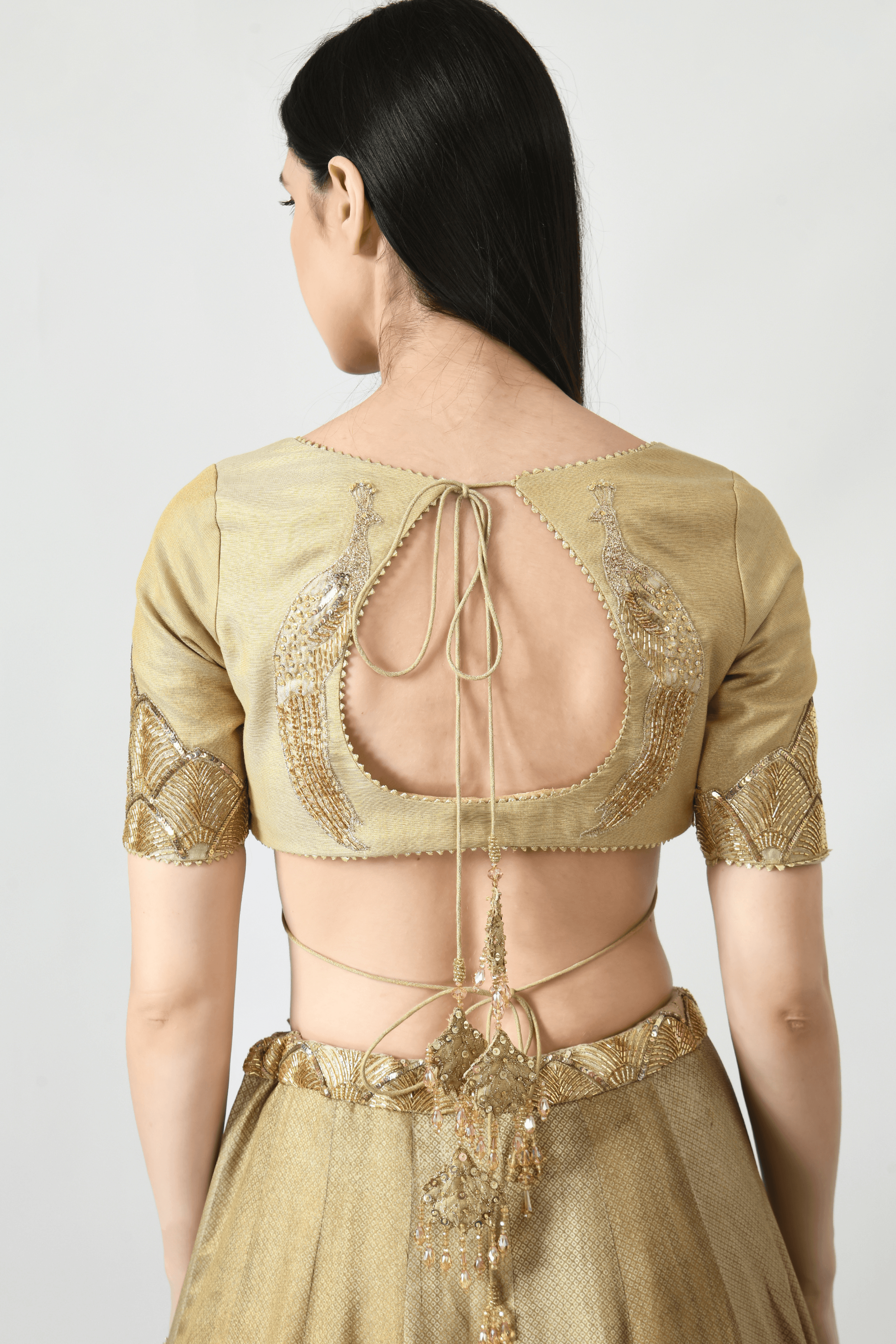 Layla Lehenga featuring a detailed blouse, embellished lehenga, and traditional Indian designs.