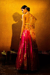 Halter neck blouse’s button closure and decorative tassels. Designer wear for women handcrafted by Moledro.