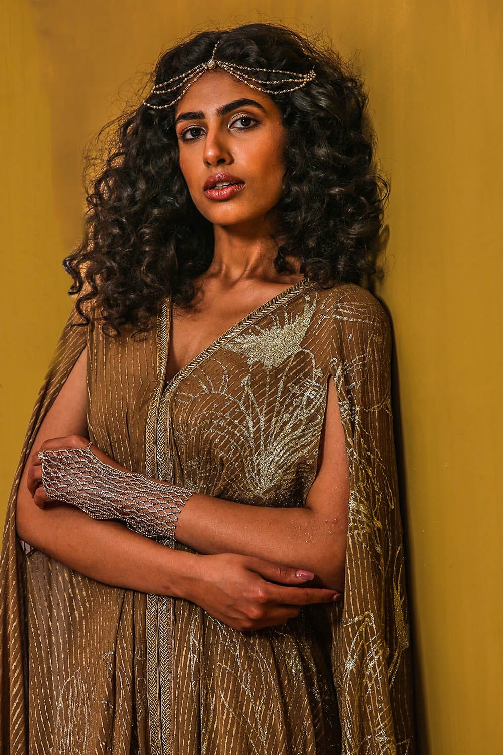 Close-up of glittered floral designs on the soft georgette fabric.