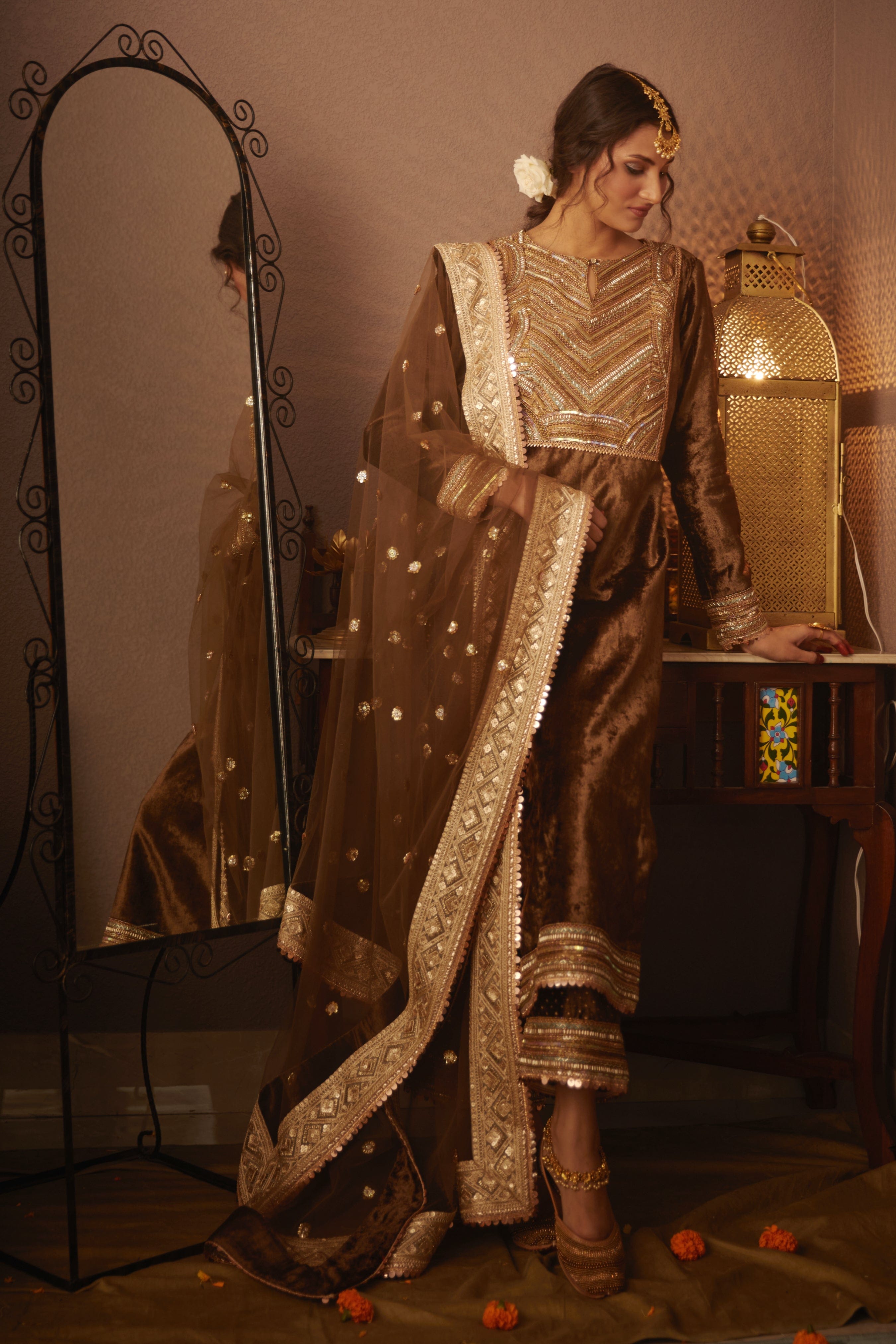 Nora Kurta Set in olive green velvet with polka dot pants and net dupatta.