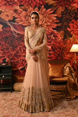 Reem Bridal Saree by Moledro in blush pink with floral embroidery and pre-draped fishcut design for Dubai weddings.
