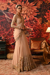 Combination of zari brocade and butterfly net enhancing the bridal saree’s luxurious feel.